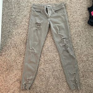 Gray distressed American eagle skinny jeans